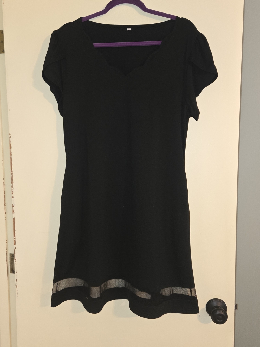 Classic Black Midi Dress with Sheer Hem